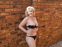 Striptease and Make water by chubby Mature naked blonde extensively in the garden courtyard